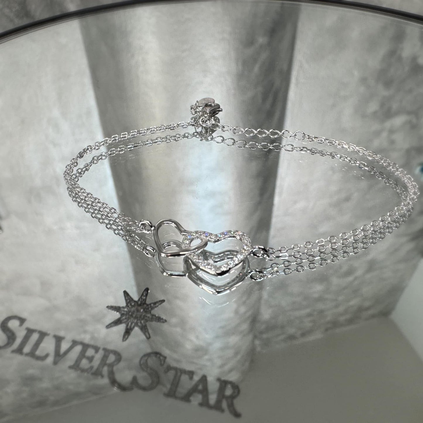 Srebrna narukvica Srce u srcu sa cirkonima - Silver Star